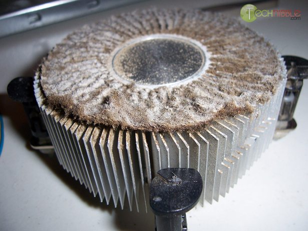 Computer heatsink blocked by cigarette tar and dust