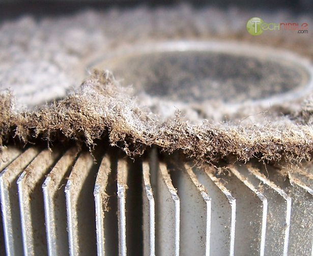 Computer heatsink blocked by cigarette tar and dust: Closeup