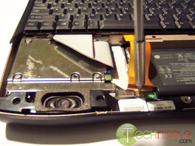 Screwing the shield back in place