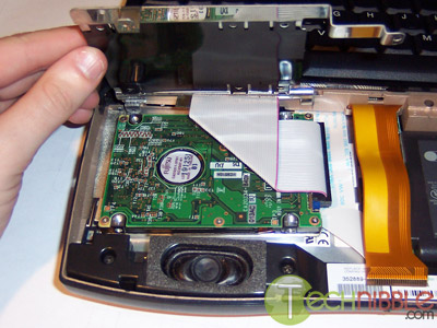 Lift the shield which will show you the laptop harddrive.
